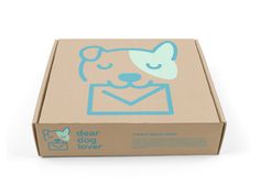 a cardboard box with an image of a dog on it's face and the words dear dog lover written in blue