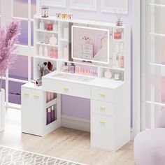 there is a desk with a mirror and drawers in the room that has purple walls