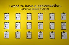 a bulletin board with several pieces of paper pinned to it that says i want to have a conversation let's find common ground