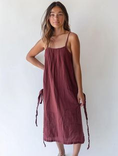 Embrace the freshness of spring with this casual strappy linen dress, perfect for sunny days and laid-back outings. Designed for women who love effortless style, this dress offers a lightweight feel and a breezy silhouette, making it a must-have for your warm-weather wardrobe.Crafted from high-quality, breathable linen fabric for a soft, comfortable fitFeatures adjustable straps for a customized and relaxed fitIdeal for casual spring days, beach outings, or garden partiesLightweight design ensur Cotton Suspender Dress For Spring Vacation, Casual Suspender Dress For Vacation, Summer Cotton Sundress Suspender Dress, Sleeveless Cotton Suspender Dress For Beach, Casual Suspender Dress For Beach, Spring Cotton Sundress Suspender Dress, Summer Style Suspender Dress With Tie Straps, Casual Summer Suspender Dress With Tie Straps, Cotton Sundress With Spaghetti Straps