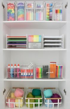 the shelves are organized with craft supplies and crayons