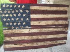 an american flag made out of pallet wood