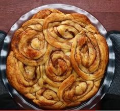 there is a pie that has been baked in the oven and ready to be eaten