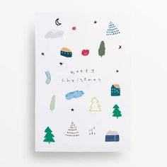 a christmas card with trees, clouds and stars on the cover is shown in white