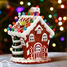 a gingerbread house with candy on the roof