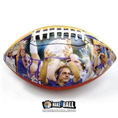 a close up of a football with people on it and the ball is painted to look like an american football player