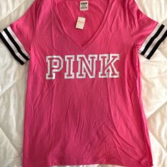 New With Tags!!! Comfortable And Lightweight Fabric “Pink” In White Lettering Striped Detail On Sleeve Cuff Size Medium Pit To Pit: 17” Length: 25” Pink V-neck T-shirt With Letter Print, Sporty Pink T-shirt For Loungewear, Trendy Pink V-neck T-shirt, Trendy Pink V-neck Top, Pink Cotton V-neck T-shirt, Light Purple Shirt, Hot Pink Shorts, Future Outfit, Pink Neon