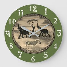 a clock with an image of elephants and zebras