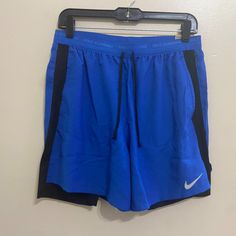 Nike Men's Dri-Fit Stride 2-In-1 Blue Running 5” Shorts Dm4757-480 Size M New Blue Running Bottoms For Summer, Nike Blue Activewear With Built-in Shorts, Blue Bottoms With Built-in Shorts For Running, Functional Blue Shorts For Running, Blue Nike Athletic Shorts For Running, Nike Blue Athletic Shorts For Running, Nike Blue Athletic Running Shorts, Blue Functional Swim Trunks For Sports, Functional Blue Swim Trunks For Sports