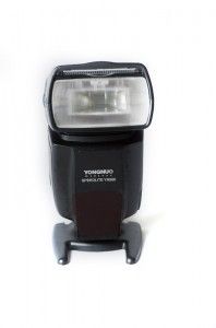 a camera flash with the light on it's side