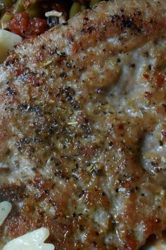 a close up of food on a plate with broccoli