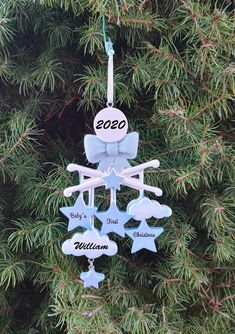 a christmas ornament hanging from a tree