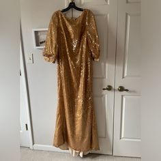 Iridescent Gold Sequin Badgley Mischka Floor-Length Gown - Size 14, Nwt. 3/4 Banded Sleeve. In Box With Original Tissue. Smoke-Free Home. Holiday Sequined Mother Of The Bride Dress For Wedding, Holiday Sequined Mother Of The Bride Wedding Dress, Formal Shimmer Evening Dress, Champagne Holiday Evening Gown, Formal Shimmer Maxi Evening Dress, Glamorous Shimmer Evening Dress For Wedding, Formal Floor-length Sequined Mother Of The Bride Dress, Holiday Gala Floor-length Mother Of The Bride Dress, Gold Sparkling Gown For Formal Occasions