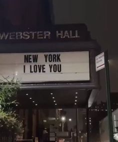 a theater marquee with the words new york i love you written on it