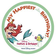 the little mermaid is sitting in front of a happy birthday sign