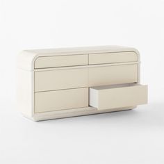 a white dresser with two drawers on it