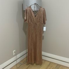 Beautiful Gold Dresses Sequin V-neck Maxi Dress For Date Night, V-neck Sequined Maxi Dress For Date Night, Gold Floor-length Midi Dress For Parties, Gold Short Sleeve Formal Dress, Holiday Floor-length Maxi Dress For Date Night, V-neck Maxi Dress For Dinner Parties, Formal Holiday Dresses With Short Sleeves, Formal Short Sleeve Holiday Dress, Holiday V-neck Maxi Evening Dress