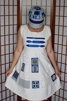 a woman wearing a dress made to look like r2d2