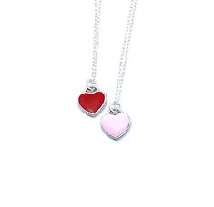 Description This tiny heart necklace is minimalistic and beautiful! Choose a pink or red heart as a symbol of your love that she can wear all the time. The heart hangs on a delicate sterling silver chain. Just choose the length. This necklace would make a lasting and memorable gift for Valentine’s Day, an anniversary, a birthday or anytime you want to let someone know they are loved! Connect Let’s stay in touch: Sign up for my VIP list for coupons, to be the first to see new releases and to be e Friendship Necklace With Heart Pendant And Charm, Double Heart Charm Necklace For Friendship, Heart Pendant Charm Necklaces For Valentine's Day, Heart Pendant Charm Necklaces For Friendship And Valentine's Day, Heart Charm Necklace For Friendship, Friendship Necklace With Heart Pendant, Minimalist Red Heart Necklace, Red Dainty Charm Necklace With Heart Charm, Red Heart Pendant Necklace For Everyday