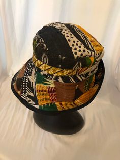 Hat, Bucket Style, Afrocentric, Ethnic, light weight, Fits size to 23 inch head. $115.00 Fitted Multicolor Cotton Hats, African Hat, Sewing Hats, African Hats, Upcycle Ideas, African Accessories, African Fabrics, Elegant Hats, Grand Rapids Mi