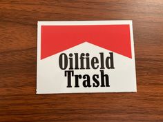 a sticker with the words oilfield trash on it