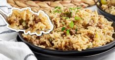 two black bowls filled with rice and meat on top of a white table cloth next to a basket