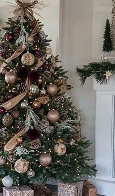 a decorated christmas tree with presents under it