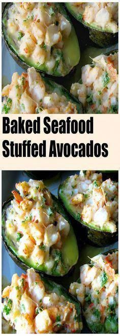 baked seafood stuffed avocados with cheese and shrimp in them are ready to be eaten