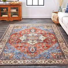 A dazzling display of the most intricately crafted floor coverings from all over the world, this Percy Blue and Rust area rug boasts the breathtaking appearance of antique authenticity. Silken shades of tradition in indigo, rust, cream, and black mingle with the more brilliant and bold magenta, gold, and aqua to create a rug that appears to be procured from an exotic bazaar. An opulent aesthetic with superior styling, this Percy area rug is the answer to today's need for affordable luxury in the home! 2' x 3' Machine washable for easy care Luxuriously vibrant colors Fade resistant polyester fabric Blue Orange Rug, Opulent Aesthetic, Wall Mount Tv Stand, Rug Backing, Rust Area Rug, Marble End Tables, White Fireplace, Washable Area Rug, Cube Ottoman