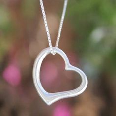 Fair Trade Heart Shaped Sterling Silver Pendant Necklace - Living Love | NOVICA Nameplate Necklace Silver, Modern Heart, Contemporary Jewelry Design, Silver Jewelry Box, Silver Heart Ring, Elephant Bracelet, Fine Silver Jewelry, Jewellery Silver, Sterling Silver Rings Bands