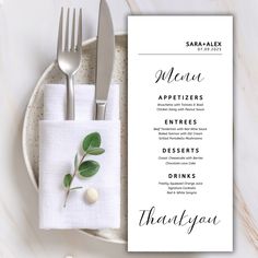 a table setting with silverware, napkins and place settings for an appetizer