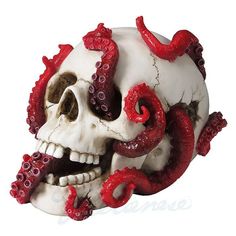 a skull with red tentacles attached to it's face and mouth is shown in front of a white background