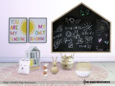 there is a blackboard with writing on it and other toys in front of it