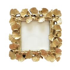 an ornate gold frame with leaves on it