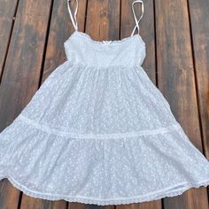 Frankies Bikinis Mini Eyelet Lace Dress. White Tiered Dress Like New. Size Medium- Would Best Fit A Size Small White Fitted Sundress For Beach Cover-up, Fitted Summer Sundress With Lace Trim, Beach Season Mini Dress With Lace Trim, White Fitted Sundress For Beachwear, White Lace Trim Sundress For Summer, Summer Sundress With Lace Trim For Day Out, Summer Daytime Dresses With Lace Trim, Summer Daytime Dress With Lace Trim, Summer Mini Sundress With Lace Trim