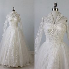 a white wedding dress with long sleeves and a bow on the back, is shown