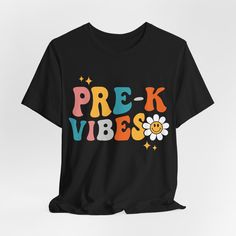 This updated, short-sleeve Pre K Vibes crewneck graphic tee fits like a well-loved favorite. Super soft cotton and excellent quality print will make you fall in love with it over and over again. .: 100% Soft cotton (fibre content may vary for different colors) .: Light fabric (4.2 oz/yd² (142 g/m .: Retail fit .: Tear away label .: Runs true to size Unsure about sizing?  Please measure one of your favorite t-shirts and compare its measurements to the size chart to ensure a great fit. Bella + Can School Spirit Short Sleeve T-shirt With Letter Print, Black Graphic Print T-shirt For School, Trendy School T-shirt With Slogan, Retro Crew Neck T-shirt For School, School T-shirt With Graphic Print And Relaxed Fit, Retro Black T-shirt For School, Relaxed Fit Graphic Print T-shirt For School, Summer School Spirit T-shirt With Graphic Print, School Spirit Black Short Sleeve T-shirt