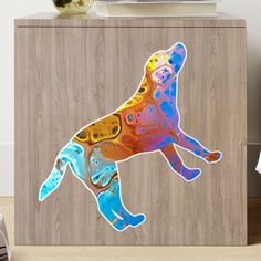 an image of a dog that is on the side of a cabinet