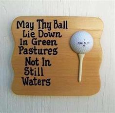 a wooden plaque with a golf ball and tee on it that says, may thy ball lie down in green pastures not in still waters