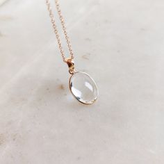 This stunning Pendant is set in 14k Solid Yellow Gold with Natural Clear Quartz with utmost precision. It is a unique gemstone Pendant for nearly every occasion and is completely hassle-free jewelry. ITEM DETAILS: * GEM: Clear Quartz * GEM SIZE: 10X14 mm * GEM SHAPE: Oval * GEM WEIGHT: 6.92 carats * Gold Purity: 14KT * Gold Weight: 0.53 gram * Total Weight: 1.91 gram The Gold purity is guaranteed and it comes with authentic 14KT gold hallmark. Since my items are handmade, they are absolutely nickel and lead free. CUSTOMIZATION: * Gemstone customization is available and it can be substituted with a gem of your choice. Kindly message me for the same. PACKAGING * The Pendant comes with layers of safe and secure wrapping along with Free handmade jewelry box with every purchase. ➡️Head to these Timeless Faceted Jewelry For Gift, Elegant Bezel Set Gemstones For Anniversary, Elegant Gemstones With Bezel Setting For Formal Occasions, Heirloom White Gold Jewelry With Gemstone Accents, Elegant Bezel Set Gemstones For Formal Occasions, Elegant Formal Gemstones With Bezel Setting, Timeless Jewelry With Gemstone Accents For Gift, Timeless Oval Faceted Jewelry, Classic 14k Gold Jewelry With Gemstone Accents