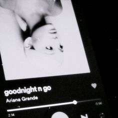 a cell phone with an image of a baby on it's screen and the words goodnight go aria grandee