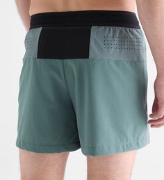 Our breathable, lightweight, cardio-focused shorts are designed for running, training, and all-day performance. The laser perforation and mesh waistband enhance ventilation, keeping you cool and comfortable during any type of workout while offering flexibility and support wherever your day takes you. | NOBULL - Men's Hybrid Short 5" - Balsam Breathable Mesh Athletic Shorts For Workout, Functional Athletic Shorts With Breathable Mesh For Workout, Functional Athletic Shorts For Light Sports, Breathable Nylon Athletic Shorts, Technical Nylon Athletic Shorts For Training, Breathable Mesh Athletic Shorts For Training, Technical Athletic Shorts With Breathable Fabric, Functional Nylon Athletic Shorts For Running, Breathable Green Running Shorts