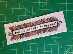 there is no such thing as too many books cross stitch bookmark pattern on white paper