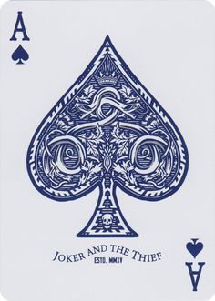 a blue and white playing card with the words joker and the thief written on it