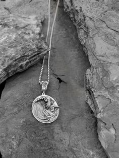 Adorned with a genuine white diamond - the Sterling Silver Nami pendant is the embodiment of the power and fury of the ocean waves.  A must for all ocean lovers -  This piece draws its inspiration from famous Japanese painting "The Great Wave off Kanagawa" by Hokusai.  In Japanese culture - the constant cycle of waves has signified tranquility as well as powerful ferocity and resilience. "Let what is past flow away downstream" - Japanese Proverb 23.5 mm tsunami, tsunami wave, ocean jewellery, se Surfer Jewelry, Wave Pendant, Wave Jewelry, Sea Jewelry, Beach Necklace, Surfer Necklace, Beach Necklaces, Ocean Jewelry, Ocean Vibes