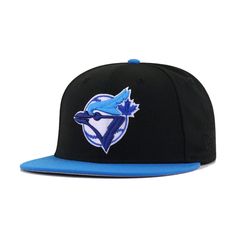 New Era Cap 59Fifty fitted hat for the Toronto Blue Jays in black and blue colorway, designed with 1991 All Star Game side patch. This Black and Blue Jays fitted stays true to its franchise roots with a unique Cardinal Blue hue injection, making this two tone uniquely beautiful. Metallic Blue hits and Blue Ink accents add flavor to the colorway. Hat Material: 100% Wool/PolyesterCrown: BlackVisor: Cardinal BlueButton: Cardinal BlueUndervisor: GreyFront Logo: Cerulean Blue/Snow White/Real Black/Me Snow White Real, Crown Black, World Baseball Classic, Cerulean Blue, New Era Cap, Toronto Blue Jays, Logo Black, Blue Jays, New Era 59fifty