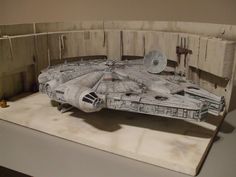 a model of a star wars ship on display