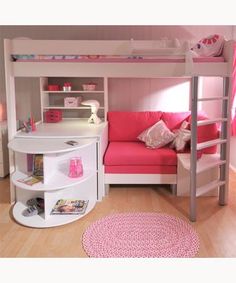 bunk bed with fuchsia pink mattress and white wooden frame in children's bedroom