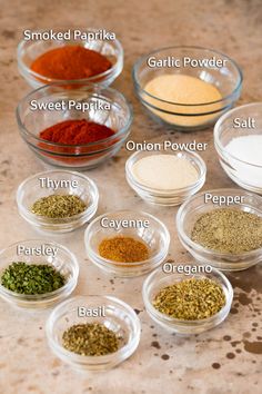 the spices in bowls are labeled with their respective names and ingredients to make this recipe