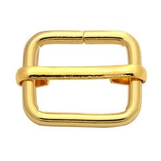 a gold buckle on a white background